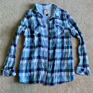 Woman’s button down shirt. Size large